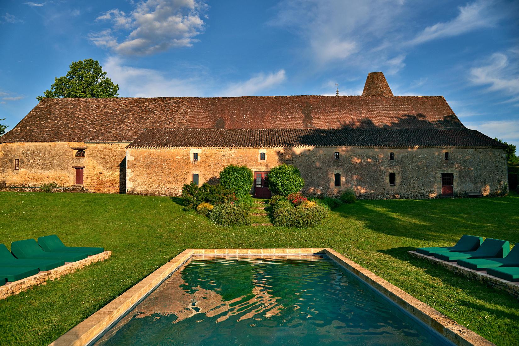 French château in the Dordogne surrounded by rolling meadows and enchanting woodlands