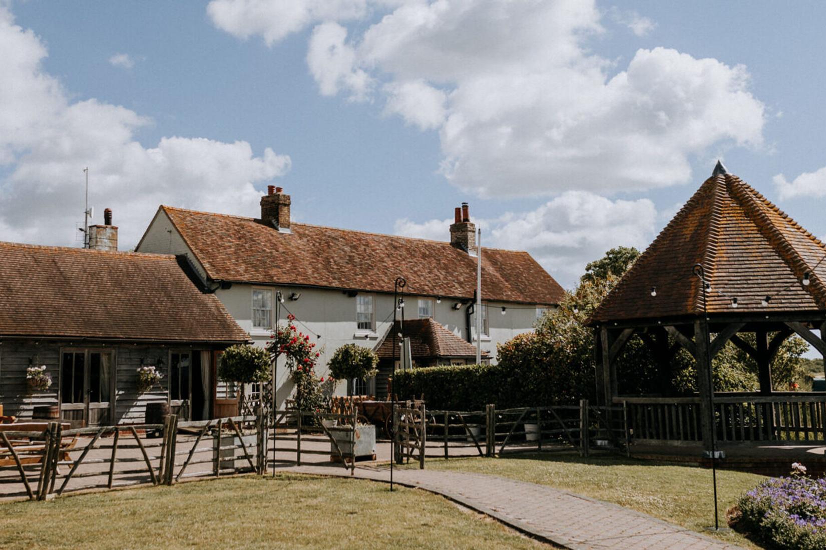 16th century old ferry house in Kent with cottages and coastal views