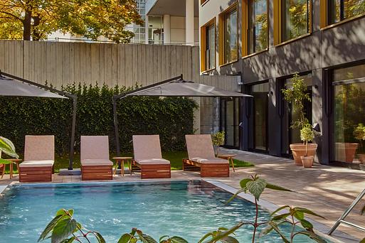 Leafy design-led hotel with swimming pool, coworking and roof terrace